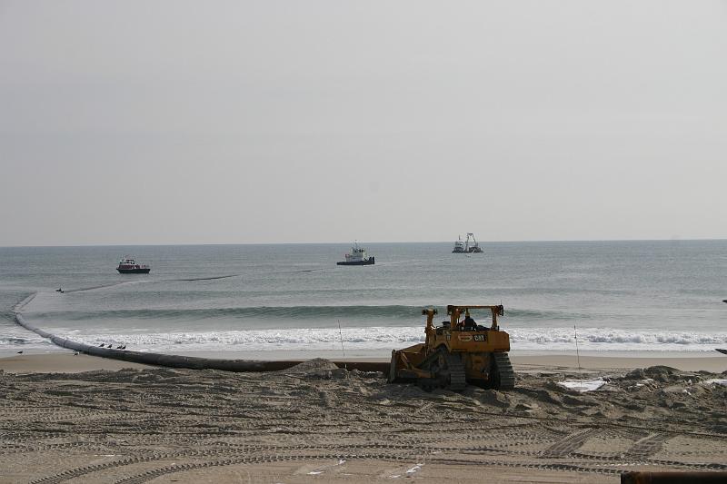 IMG_2160.JPG - pipeline being towed and pushed off shore