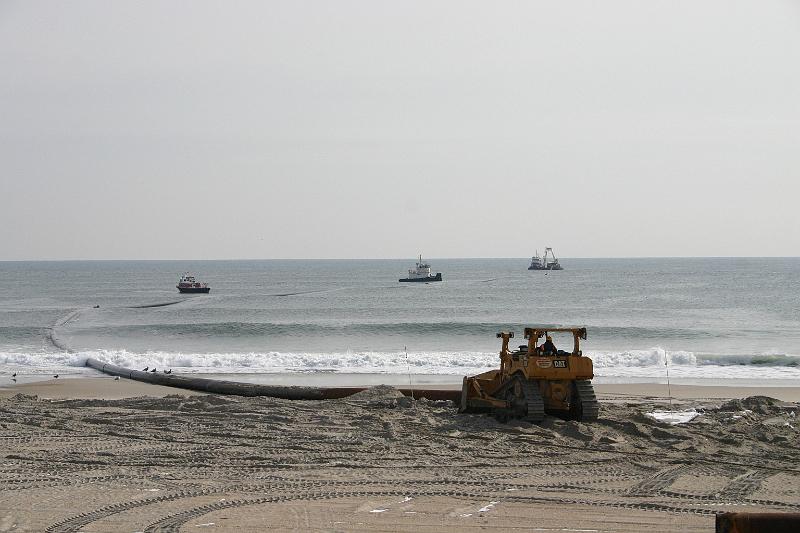 IMG_2161.JPG - pipeline being towed and pushed off shore