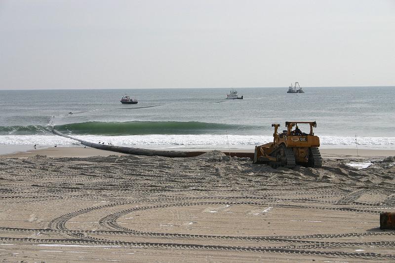 IMG_2162.JPG - pipeline being towed and pushed off shore