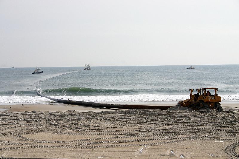 IMG_2164.JPG - pipeline being towed and pushed off shore