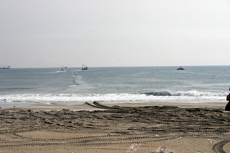 IMG_2166.JPG - pipeline being towed off shore