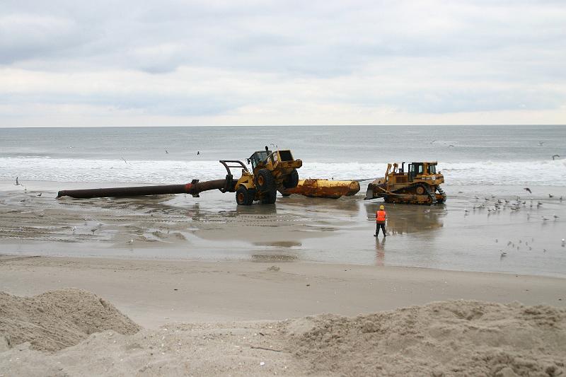 IMG_2196.JPG - installing float under pipeline